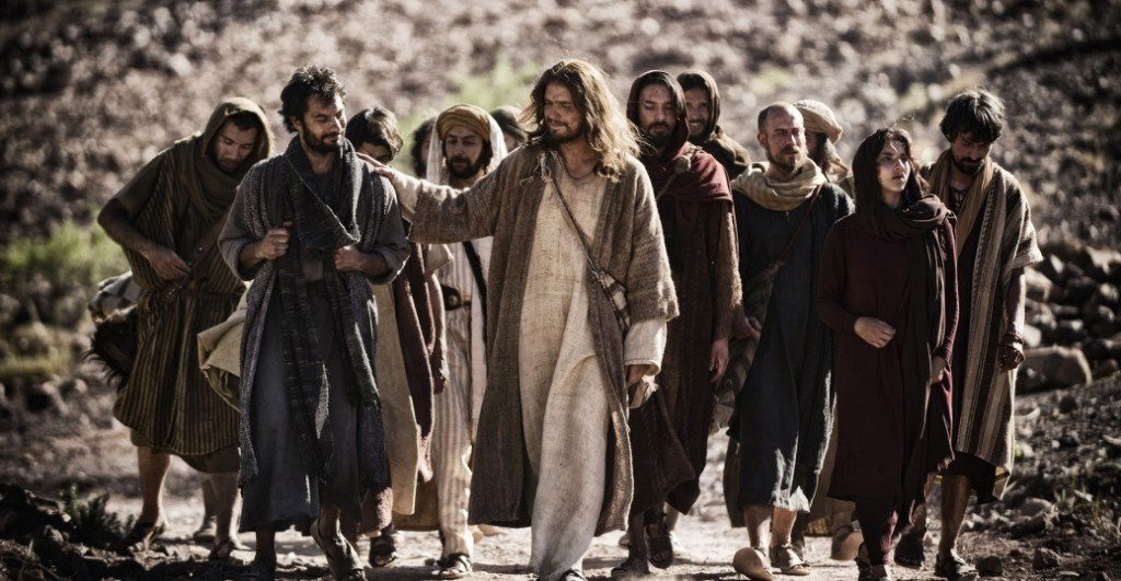 Jesus and his disciples walking